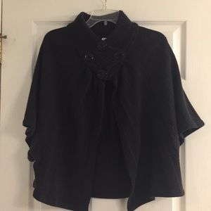 Black sweater cape with sleeves